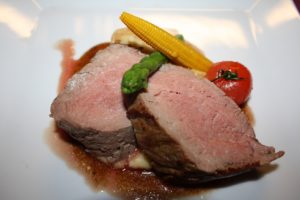 veal fillet cooked to medium rare with veggies